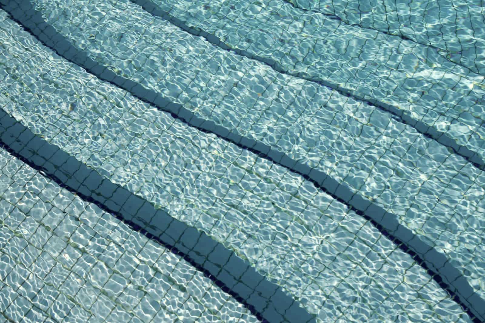 The surface of a pool under flat overcast light